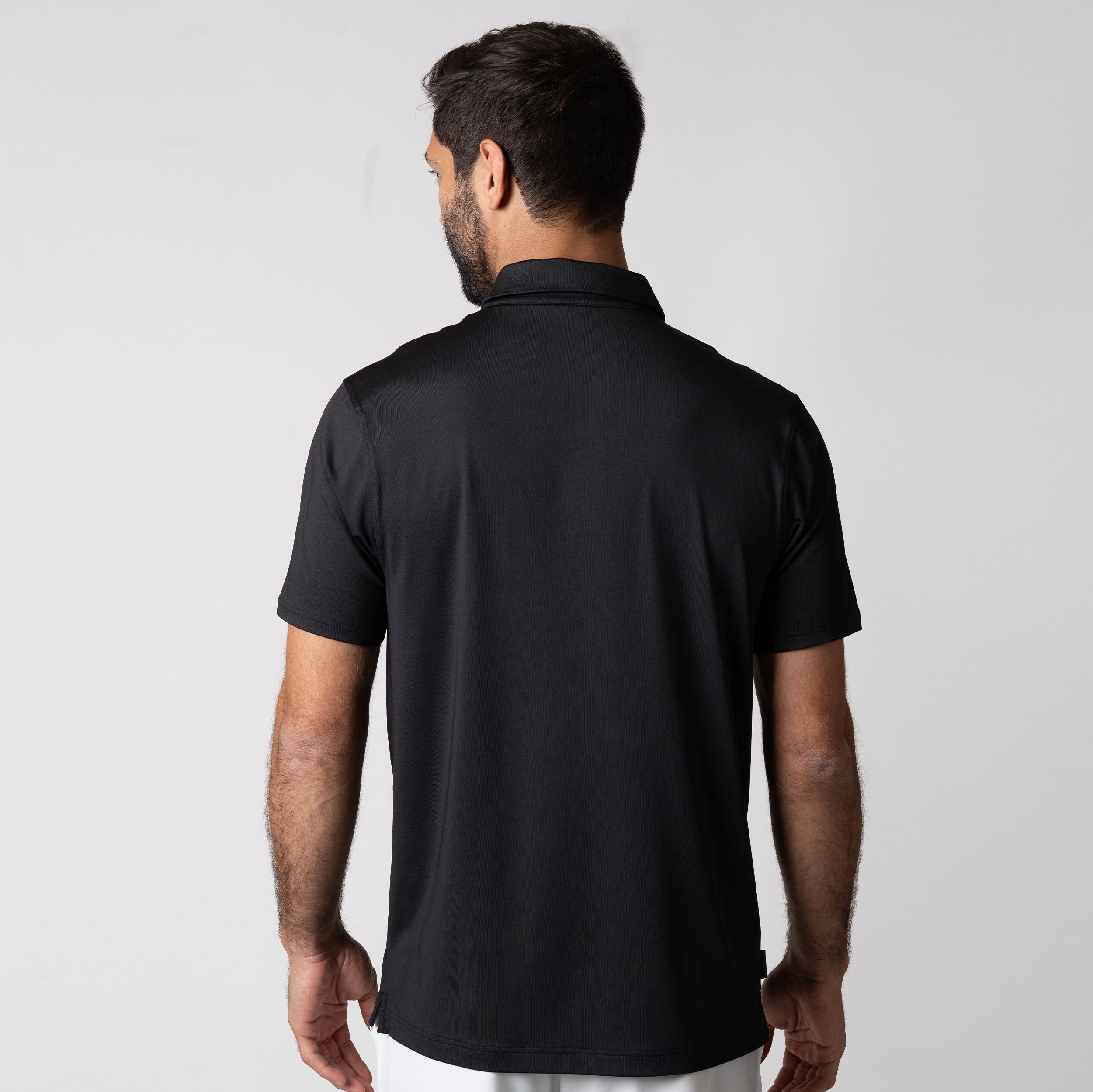 Image showing the back of a JOOLA men's club polo, black.