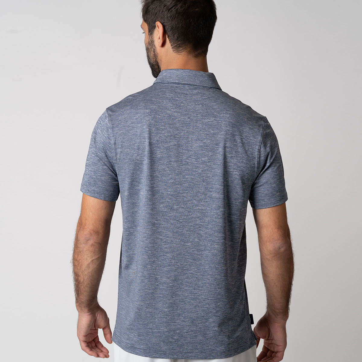 Image showing the back of a men's JOOLA club polo, navy heather.