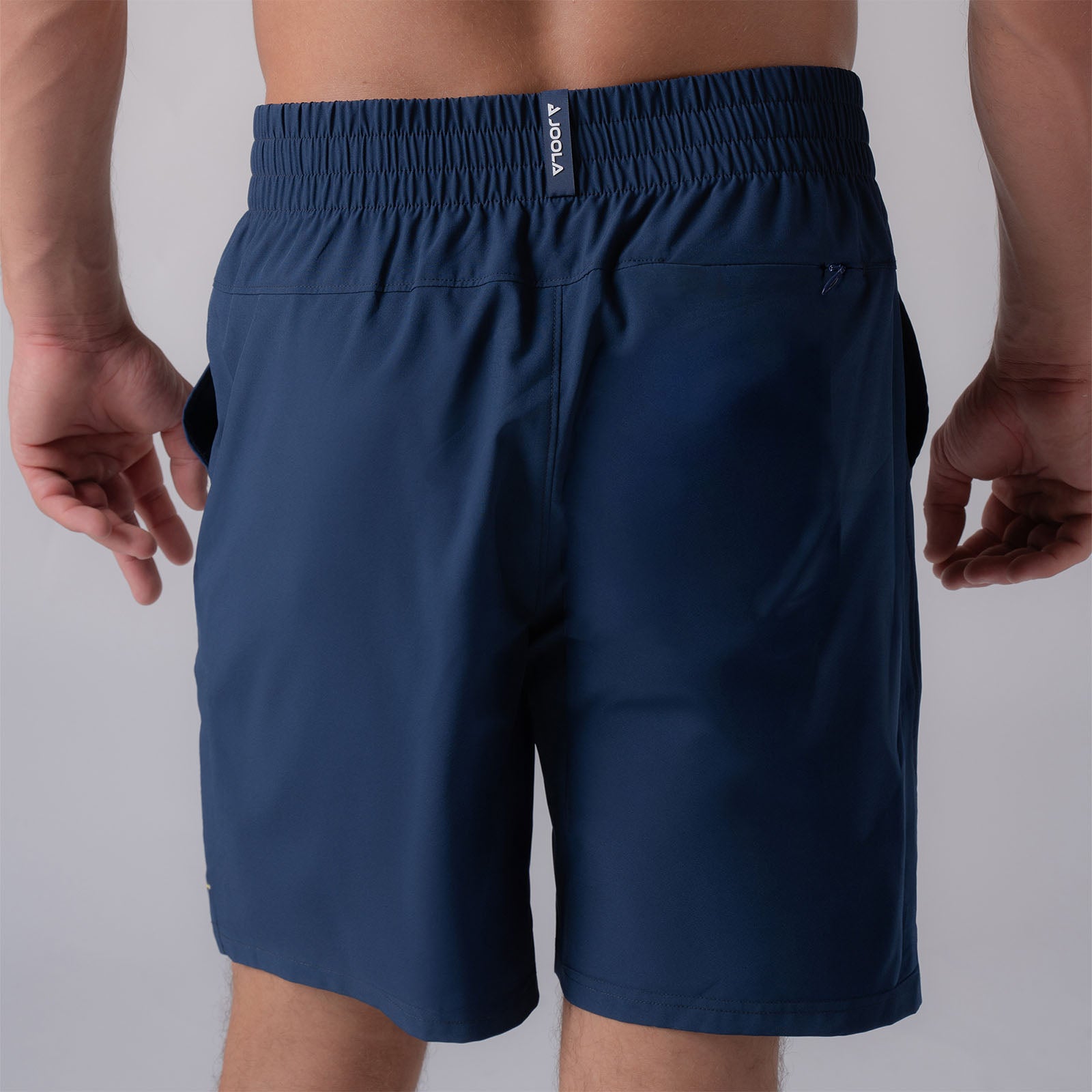 Close up image of the back of a pair of JOOLA men's woven shorts, 7 inch inseam, navy.