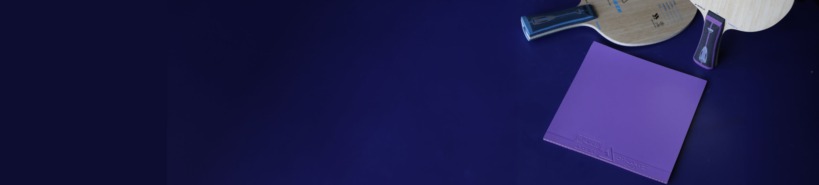 Horizontal banner image of the JOOLA Dynaryz Table Tennis rubber, purple.